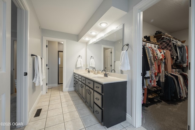 bathroom featuring vanity and tile patterned floors