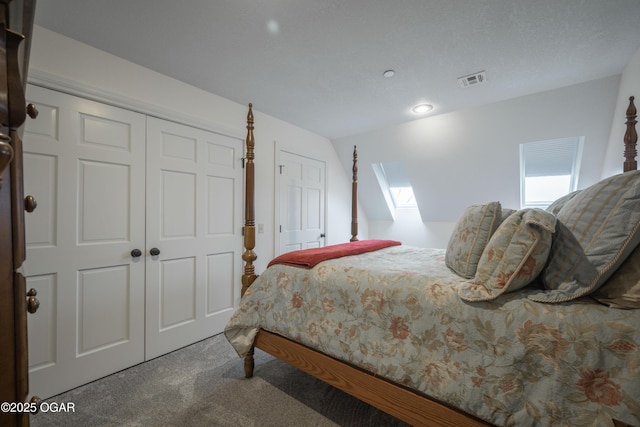 carpeted bedroom with a closet