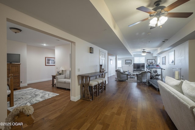 living room with dark hardwood / wood-style floors