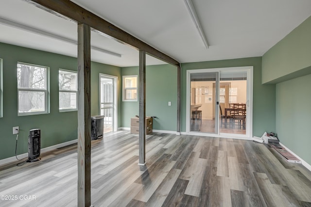 interior space featuring beam ceiling