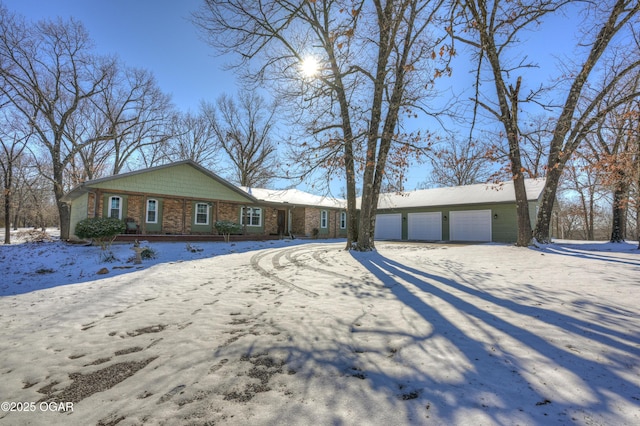 single story home with a garage