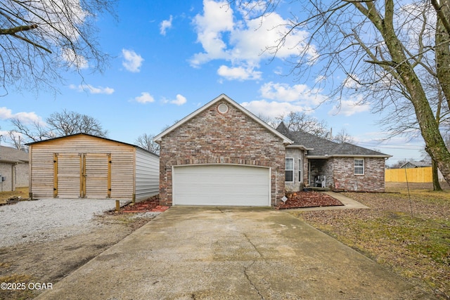 view of front of property with a storage shed and a garage