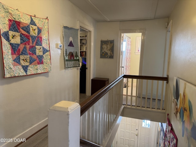 hallway featuring hardwood / wood-style flooring