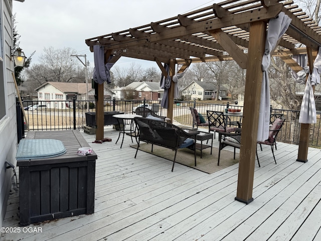 deck with an outdoor living space and a pergola