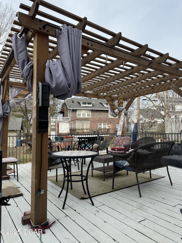 wooden terrace with a pergola