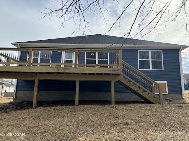 back of property with a deck