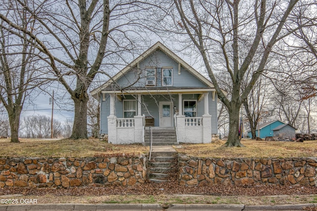 bungalow-style house with covered porch