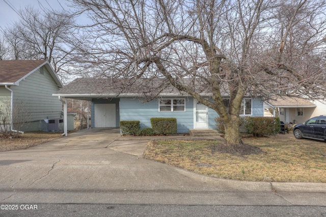 view of front of home featuring a carport