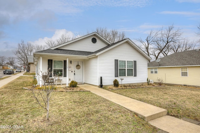 view of front of property featuring covered porch and a front yard