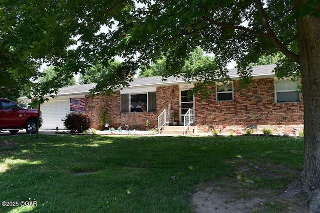 single story home with a garage and a front lawn