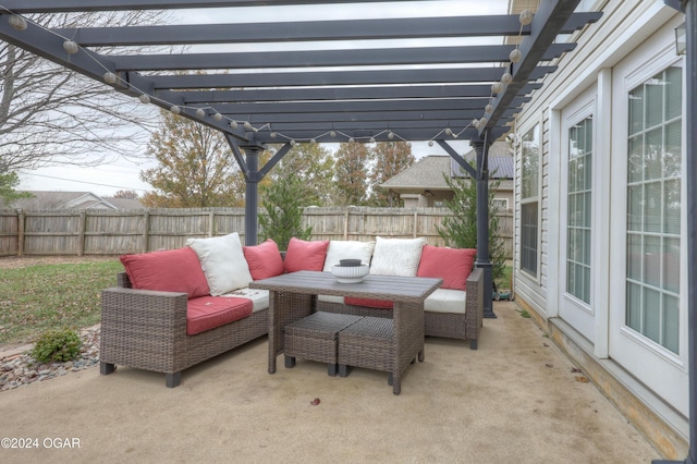 view of patio / terrace with an outdoor hangout area and a pergola