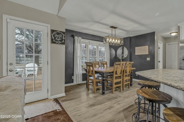 dining room featuring light hardwood / wood-style floors