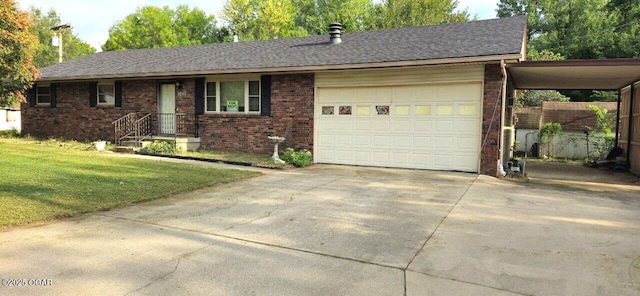 single story home with a garage and a front lawn