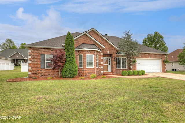 view of front of home featuring a garage, concrete driveway, roof with shingles, and brick siding