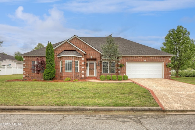 view of front of property featuring brick siding, an attached garage, driveway, and roof with shingles