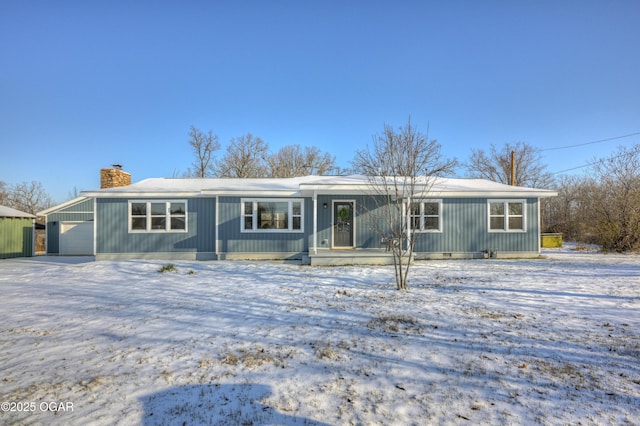 single story home with a garage