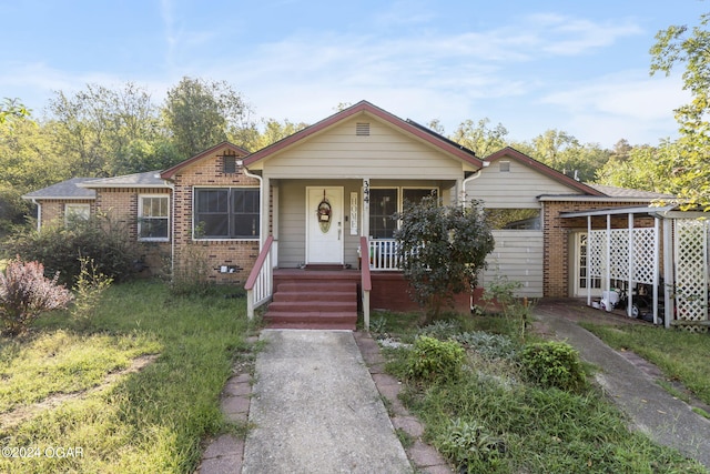 bungalow-style home with a porch