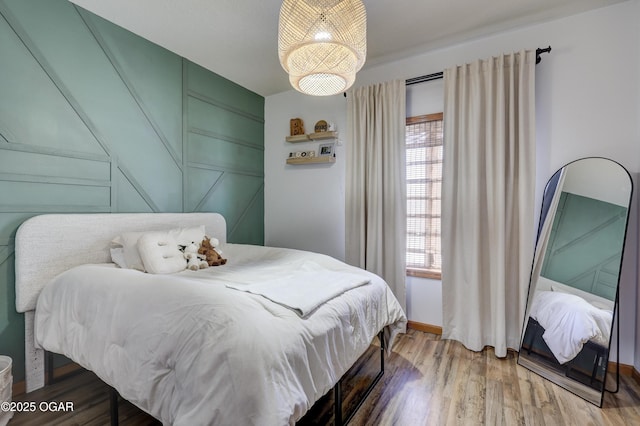 bedroom featuring hardwood / wood-style flooring