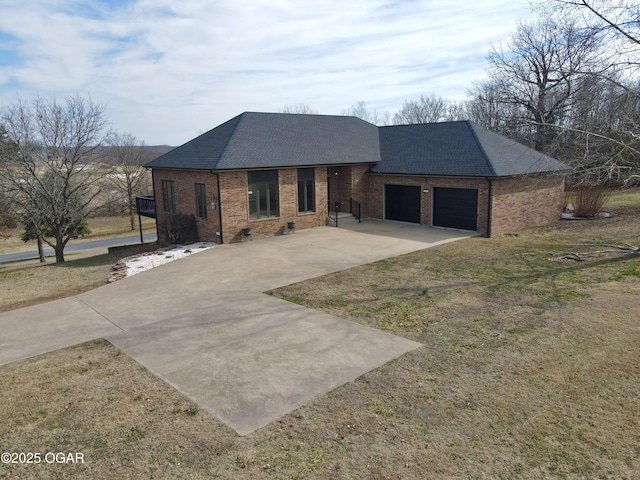 ranch-style home featuring brick siding, driveway, an attached garage, and roof with shingles