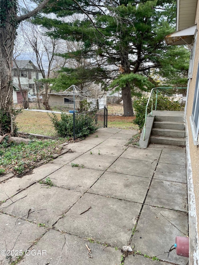 view of patio / terrace with fence