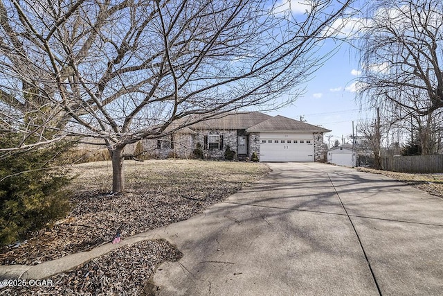 ranch-style home featuring a garage