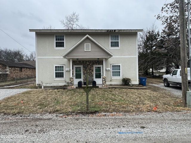 front of property featuring a front yard