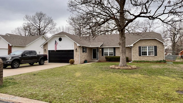 ranch-style house with a garage, concrete driveway, a front lawn, and brick siding