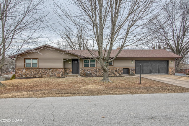 single story home featuring a garage