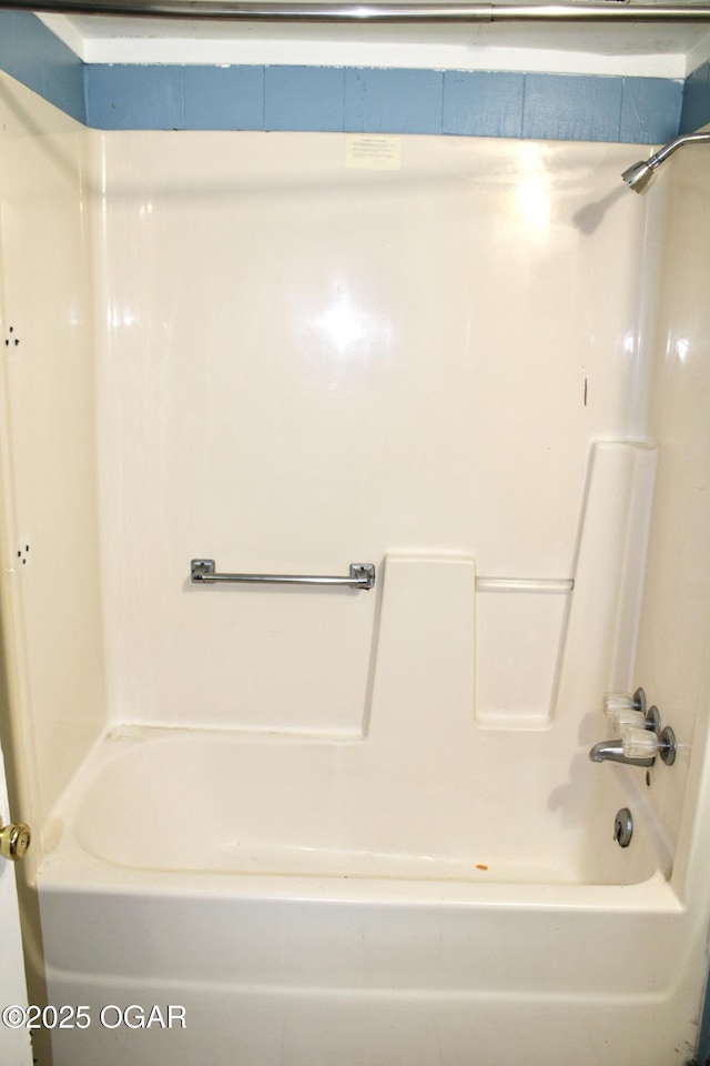 full bath featuring shower / washtub combination