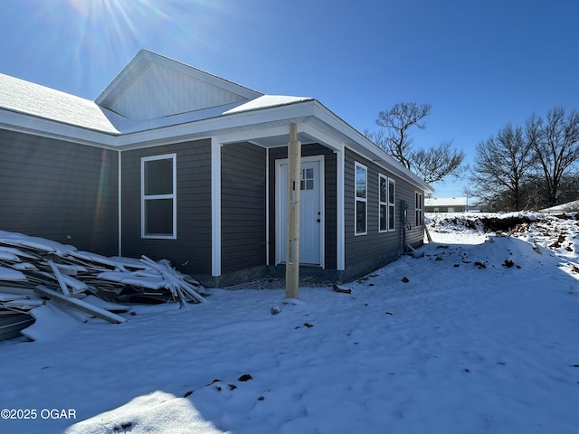 view of snow covered property