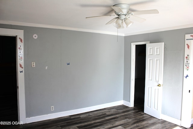 unfurnished room with baseboards, ornamental molding, ceiling fan, and dark wood-style flooring