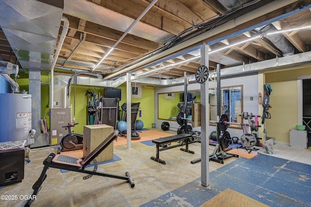 exercise room featuring gas water heater and heating unit