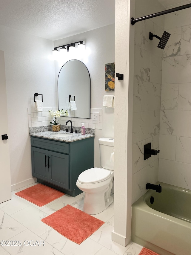 bathroom featuring marble finish floor, bathtub / shower combination, toilet, a textured ceiling, and vanity