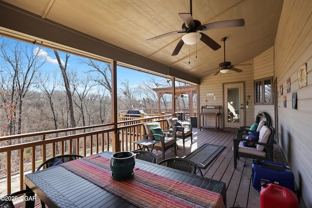 deck featuring outdoor dining space and ceiling fan