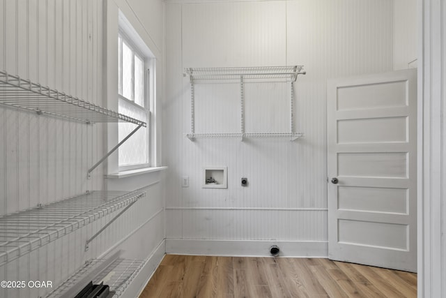 washroom featuring washer hookup, laundry area, electric dryer hookup, and wood finished floors