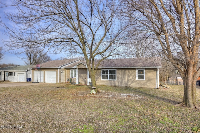 single story home with a garage and a front yard