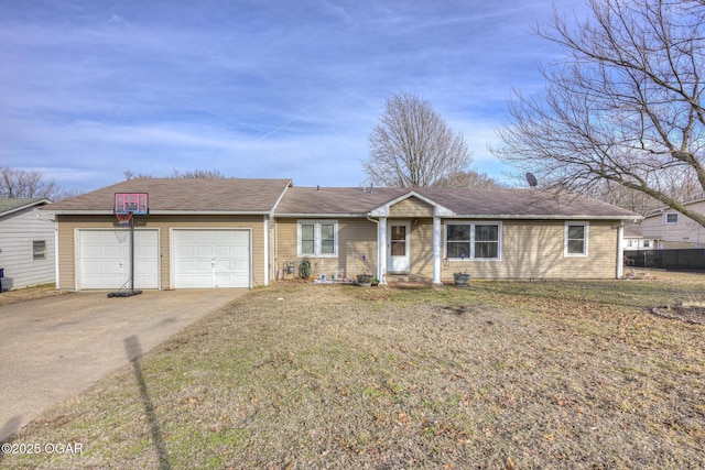 ranch-style home with an attached garage, a front lawn, and concrete driveway