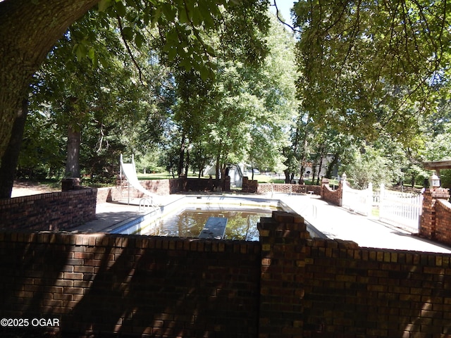 4415 Mcclelland Park Rd, Joplin, MO 64804 - view of swimming pool featuring a water slide