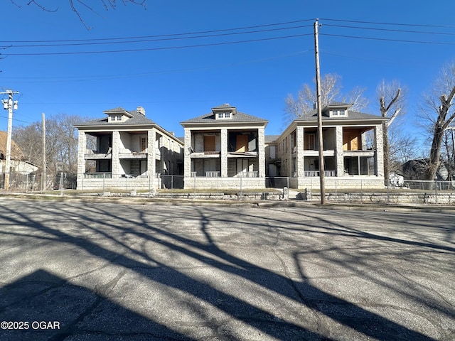 view of front of home with fence