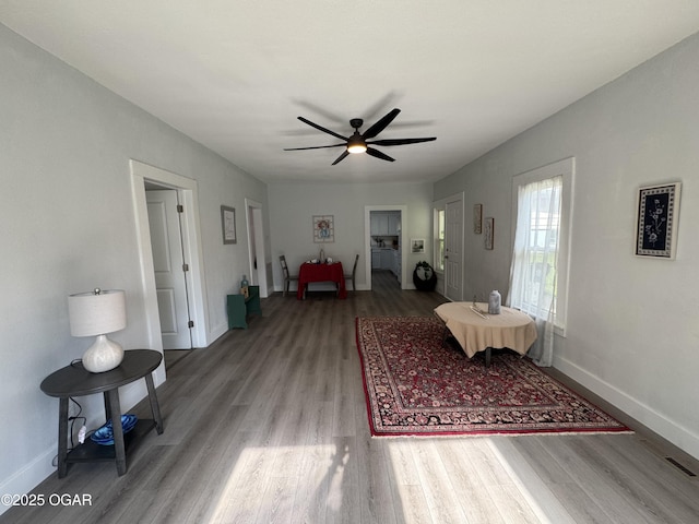 1711 Missouri Ave, Joplin, MO 64804 - living room featuring wood finished floors and a ceiling fan