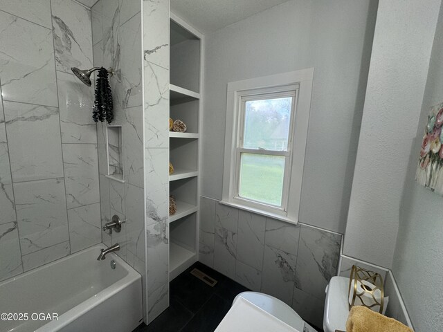 1711 Missouri Ave, Joplin, MO 64804 - bathroom with shower / tub combination and tile walls