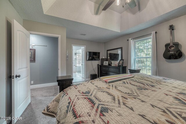 107 Oak Leaf Ter, Joplin, MO 64804 - carpeted bedroom featuring a textured ceiling, a ceiling fan, and baseboards
