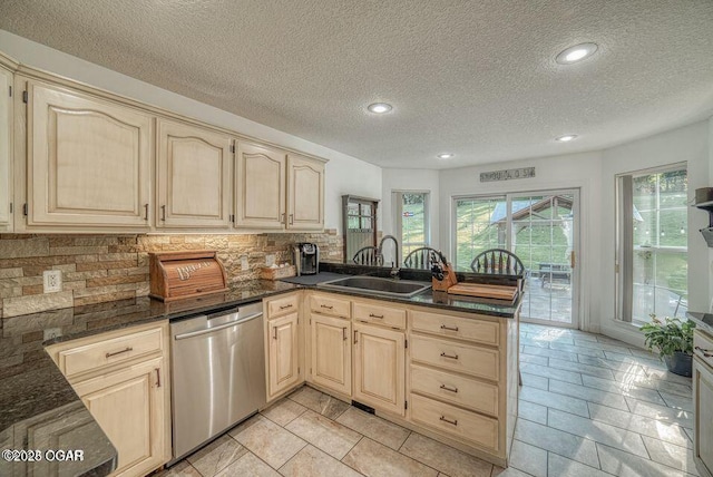 107 Oak Leaf Ter, Joplin, MO 64804 - kitchen featuring a sink, light brown cabinets, a peninsula, and dishwasher
