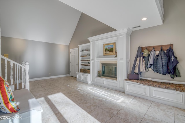 mudroom with light tile patterned flooring, recessed lighting, visible vents, baseboards, and vaulted ceiling