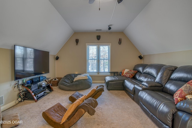 carpeted living area with lofted ceiling, visible vents, and baseboards