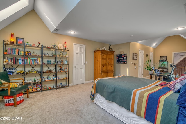 carpeted bedroom featuring lofted ceiling, visible vents, and baseboards