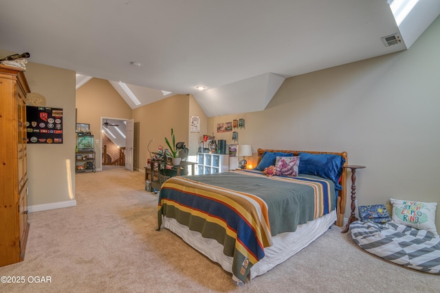 bedroom featuring light carpet, baseboards, visible vents, and vaulted ceiling