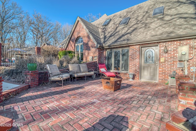 view of patio / terrace with outdoor lounge area and fence