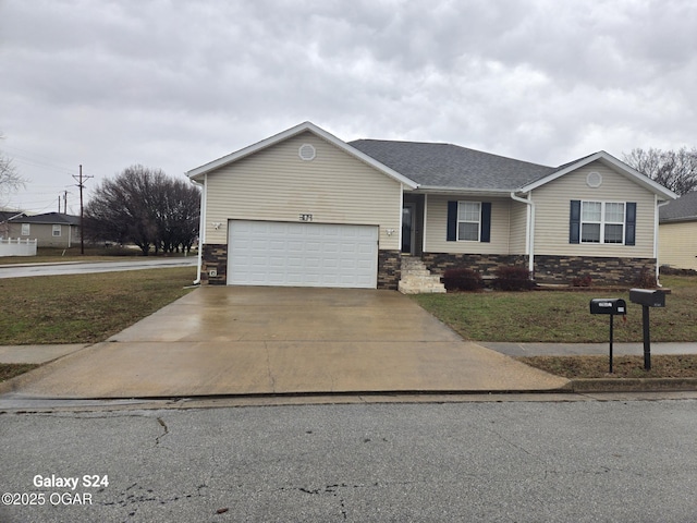 ranch-style home featuring stone siding, driveway, and an attached garage