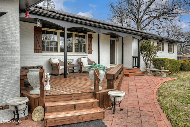 wooden terrace with a porch